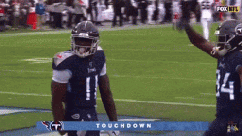 Football Player in Titans Uniform