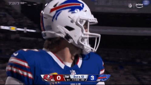 Football Player in White Helmet on Field