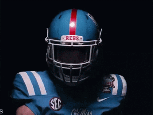 Football Player in White Helmet Rebs