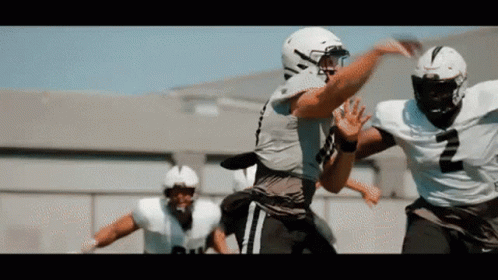Football Player in White Jersey Number 2