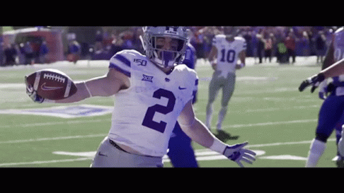 Football Player in White Jersey Number 2