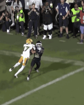 Football Player in White Jersey Number 7