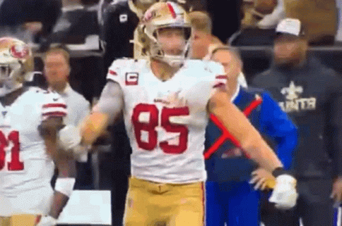 Football Player in White Jersey Number 85