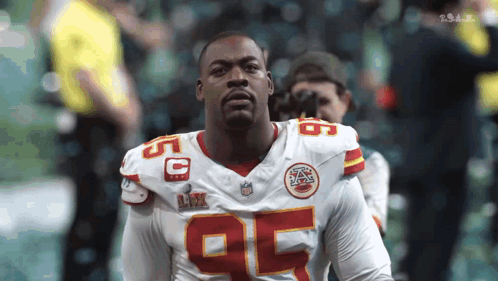 Football Player in White Jersey Number 95