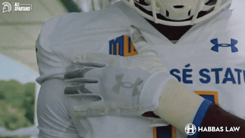 Football Player in White Under Armour Jersey With SE State