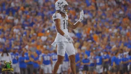 Football Player in White Uniform Number 11
