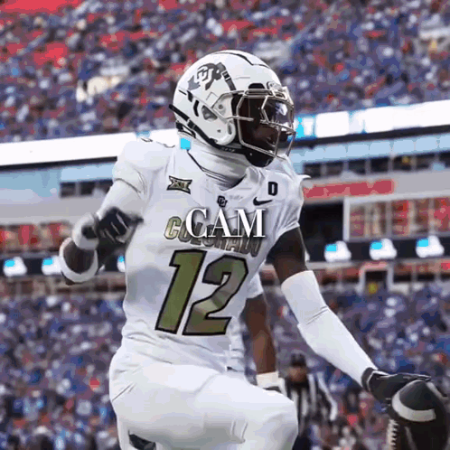 Football Player in White Uniform Number 12