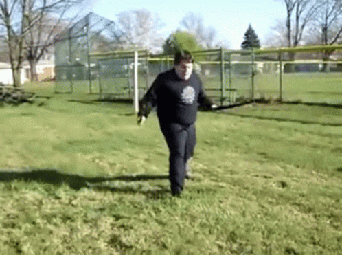 Football Player Kicking Ball