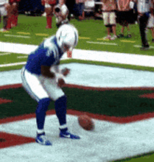 Football Player Kicking In Blue And White Uniform GIF