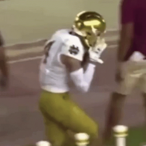 Football Player Kneeling In White Jersey GIF