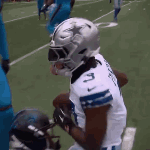 Football Player Kneeling On Field GIF