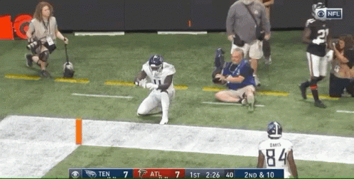 Football Player Kneeling With Number 84