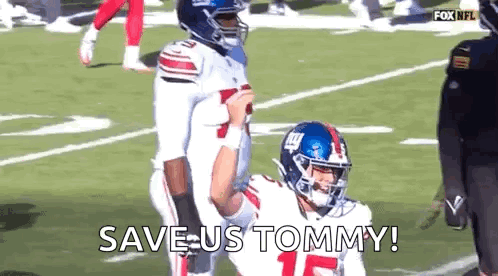 Football Player Kneeling With Player Behind GIF