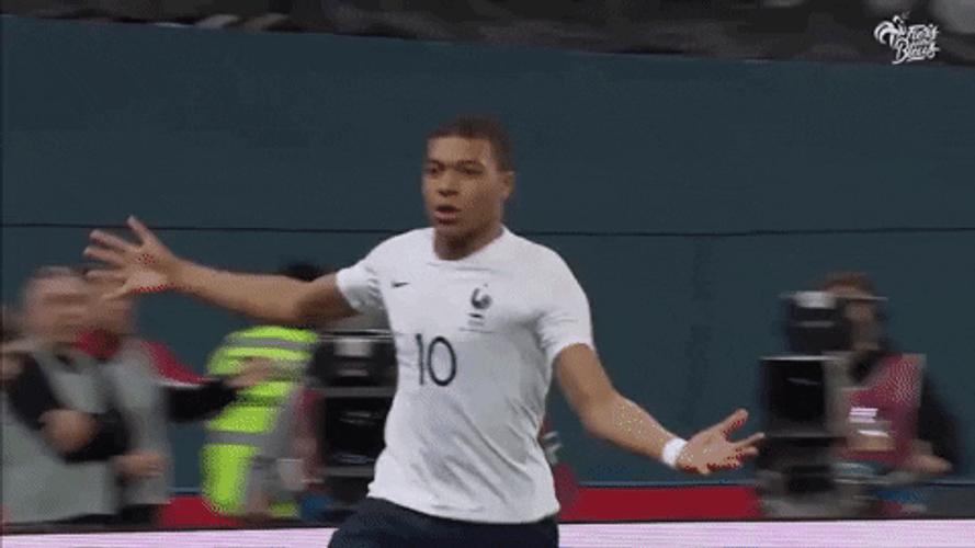Football Player Kylian Mbappe Running Arms Crossed GIF