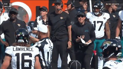 Football Player Lawrence Talking to Referee