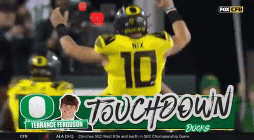 Football Player Number 10 Celebrating Touchdown GIF