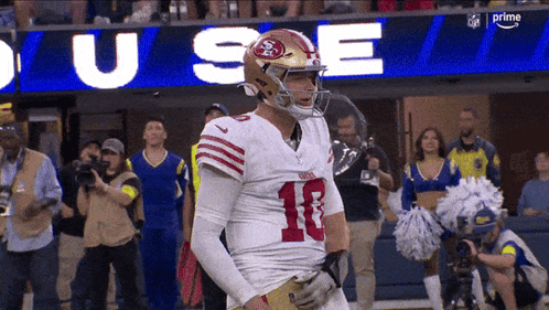 Football Player Number 10 in Front of Prime Sign