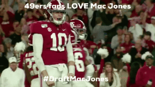 Football Player Number 10 Jersey in Front of Crowd