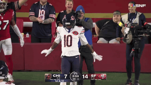 Football Player Number 10 On Field GIF
