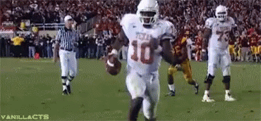 Football Player Number 10 Running With Ball