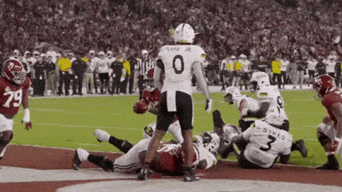 Football Player Number 10 Running With Ball