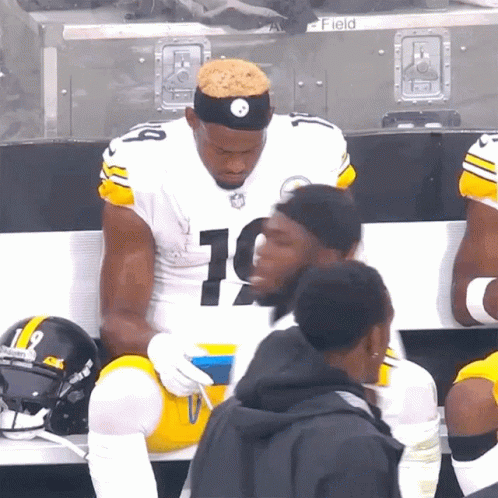 Football Player Number 10 Sitting On Bench GIF