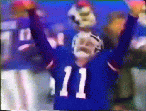 Football Player Number 11 Arms in Air