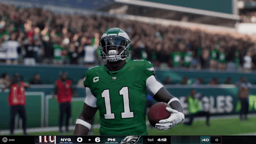 Football Player Number 11 Holding Ball GIF