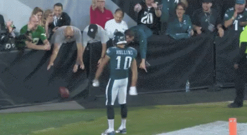Football Player Number 13 Celebrating