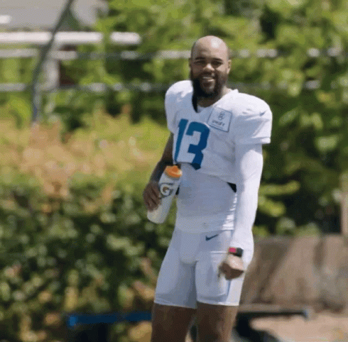Football Player Number 13 Holding Gatorade Bottle GIF