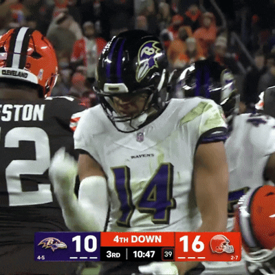Football Player Number 14 In Front Of Scoreboard GIF