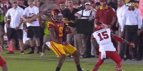 Football Player Number 15 Being Tackled GIF