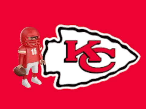 Football Player Number 15 Holding Football