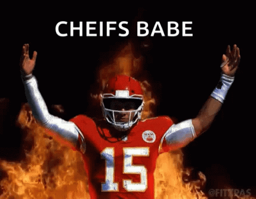 Football Player Number 15 in Front of Flames