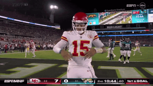 Football Player Number 15 On Field GIF