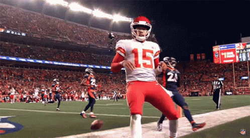 Football Player Number 15 Runs On Field GIF