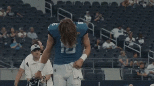 Football Player Number 16 in Stadium