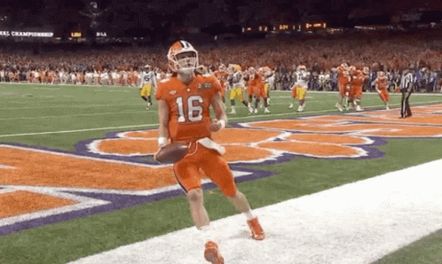 Football Player Number 16 Running
