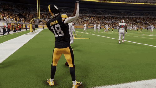 Football Player Number 18 On Field GIF