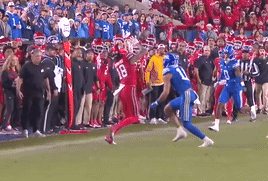 Football Player Number 18 Running