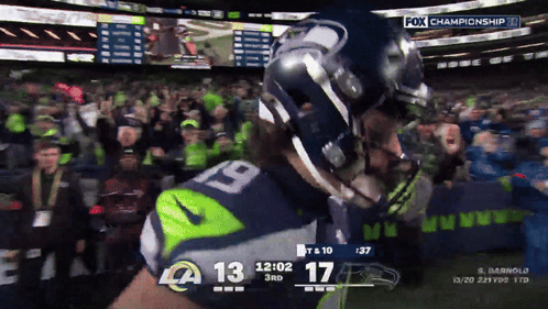 Football Player Number 19 Celebrates