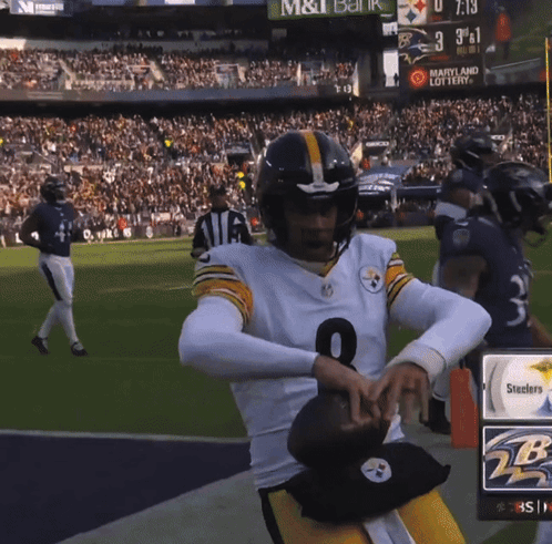 Football Player Number 2 Holding Football