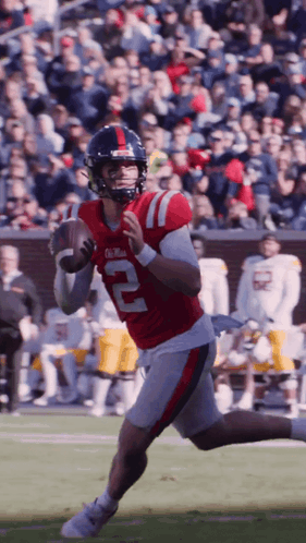 Football Player Number 2 Running With Ball