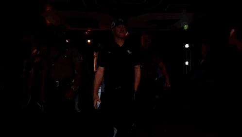Football Player Number 2 Walking Into Tunnel