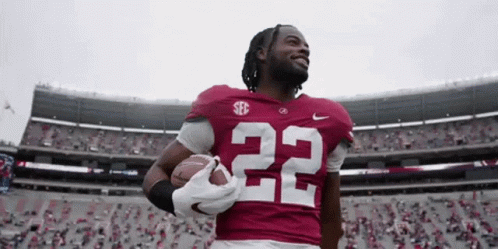 Football Player Number 22 Holding Football GIF