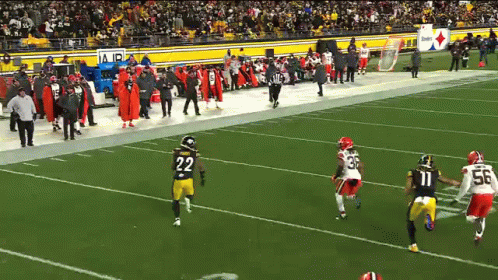 Football Player Number 22 Running On Field GIF
