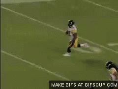 Football Player Number 22 Running On Field GIF