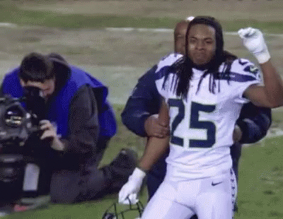 Football Player Number 25 Being Carried GIF