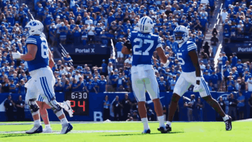 Football Player Number 27 Running