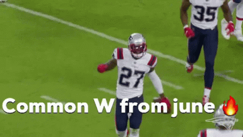 Football Player Number 27 Running